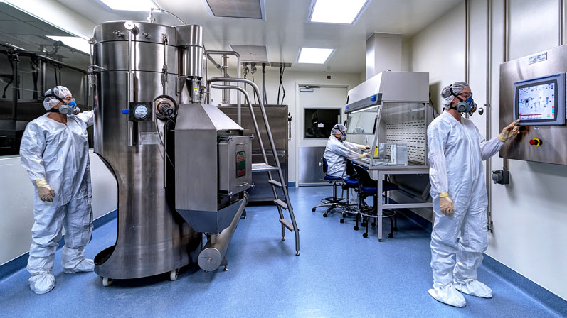 What are the benefits of using a spray drying machine